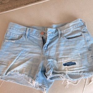 Light wash jean shorts cut offs